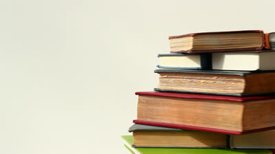 stack of books on right, multicolored